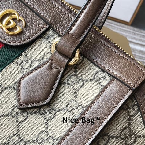 kiểm tra túi gucci.